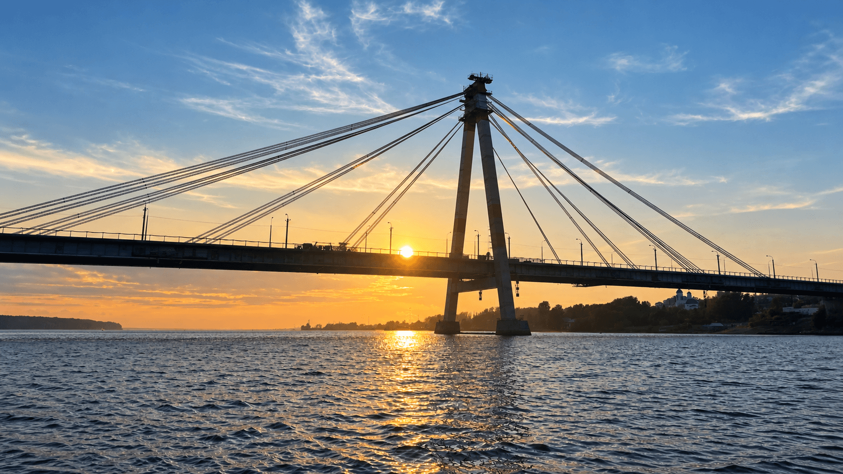 Октябрьский мост через Шексну на закате